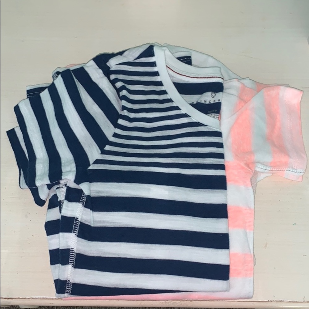 A bundle of 4 shirts.